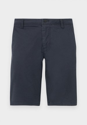 Navy blue shorts made from textured fabric, featuring a front button closure, belt loops, and standard side pockets.