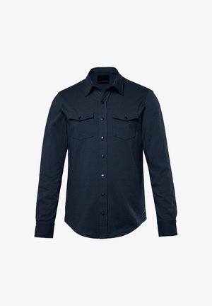 Marineblauwe lange mouwen shirt van een katoenmengsel, met een knoopsluiting aan de voorkant, twee borstzakken met kleppen en zwarte metalen knopen.