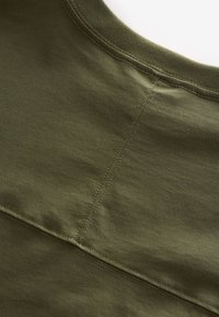 Dzsörzéruha - green