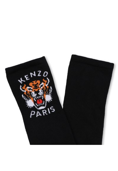 Calze nere a maglia con una grafica di tigre in arancione e bianco, con il testo "KENZO" e "PARIS" stampato sopra il design.
