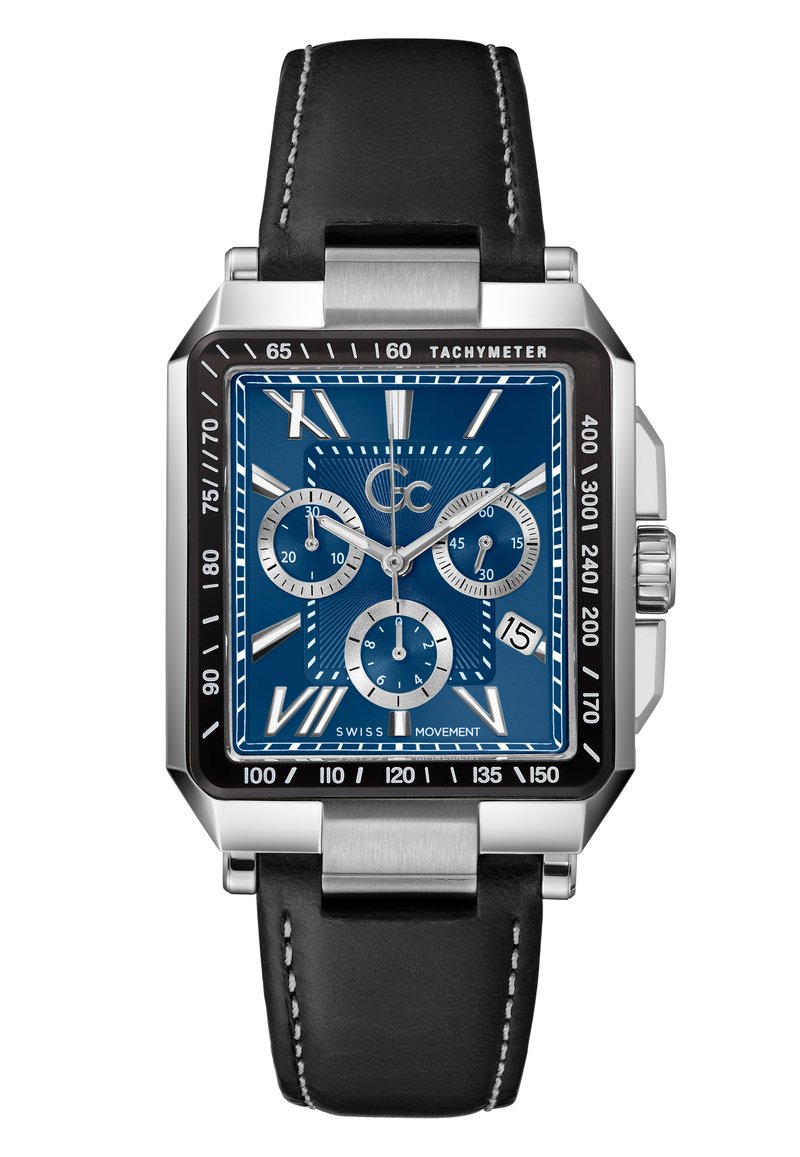 Square stainless steel watch with a blue dial, silver sub-dials, tachymeter scale, and black leather strap with white stitching.