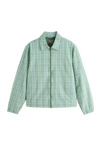 Veste zippée à carreaux verts clairs et bleus avec col et poignets élastiques, dotée de deux poches avant.