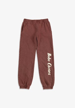Brown elastic waist and cuffed sweatpants with side pockets and white "Bobo Choses" text printed vertically on the right leg.