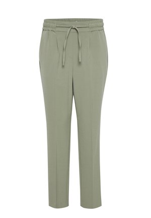 High-waisted, tapered trousers in a light olive green fabric with an elastic waistband and adjustable drawstring, featuring two side pockets.