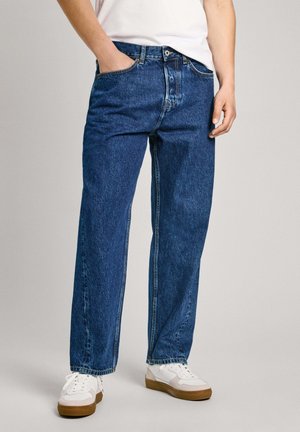 Blue denim jeans with a straight cut, five pockets, and a button fly. Features faded fabric texture and visible stitching details.