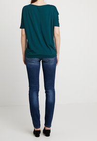 QS Triko s potiskem - teal