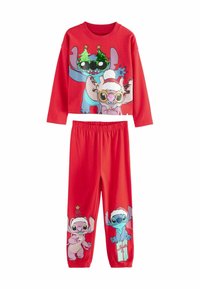 Set di pigiama rosso a due pezzi composto da una maglietta a maniche lunghe con personaggi dei cartoni animati a tema festivo e pantaloni coordinati con stampe grafiche. Tessuto morbido.