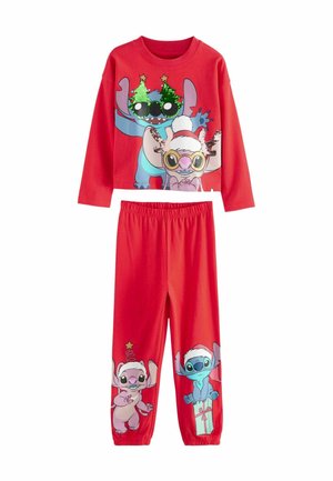 Ensemble de pyjama deux pièces rouge comprenant un haut à manches longues avec des personnages de dessins animés sur le thème des fêtes et un pantalon coordonné avec des imprimés graphiques. Tissu doux.