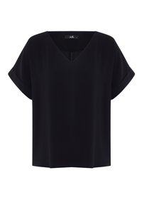 Blouse noire à manches courtes avec un col en V, fabriquée en tissu lisse. Présente des poignets retroussés et une coupe ample et carrée.