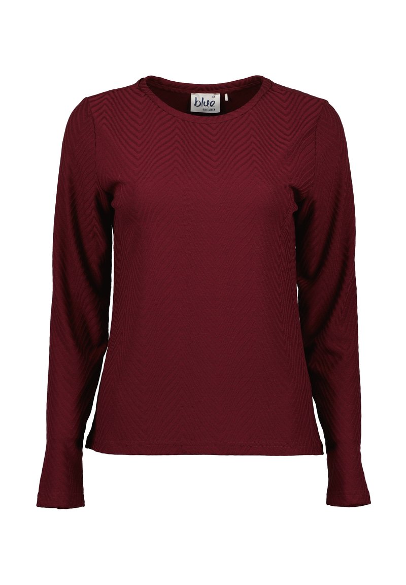 Bordeaux langemouw shirt met een gegolfd zigzagpatroon, ronde hals en zachte gebreide stof. Etiket zegt "blauw."