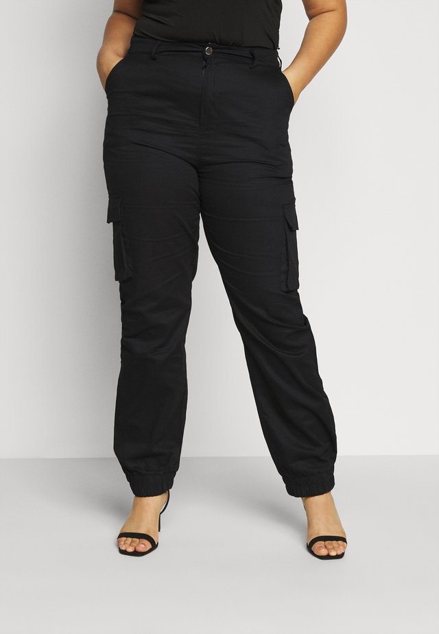 TROUSER - Reisitaskuhousut - black