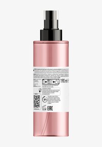 Bouteille en plastique rose avec un bouchon-pompe noir. L'étiquette contient des détails sur le produit et des informations de recyclage. Volume : 190 mL.