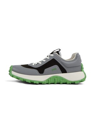 Gray and black athletic shoe with a textured design, featuring a green rubber sole, white laces, and a padded collar.