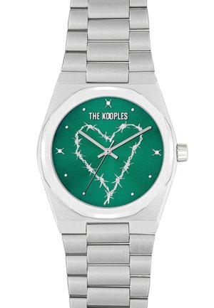 Silver stainless steel watch with an octagonal case and green dial featuring a white thorn-like heart design and silver hands.
