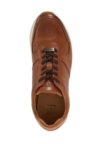 Brown leather sneaker with perforated texture, round toe, dark brown laces, and cream sole. Features logo on the tongue and soft interior.