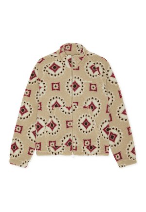 Beige színű fleece kabát mintás dizájnnal, piros, barna és fehér gyémántformákkal. Teljes cipzár és magas gallér.