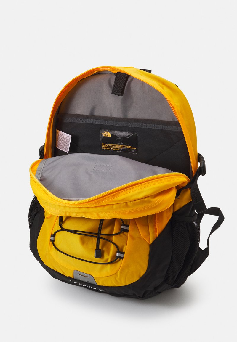 gold north face backpack Chevrolet Bowtie The Face The North Face Borealis backpack features a padded laptop sleeve to keep your tech safe and secure on the go North Face Backpack Rose Gold