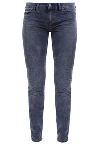 Slim-fit jeans i mörk indigo denim, med en blekt tvätt, fem fickor och knappstängning i midjan.