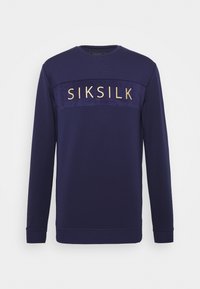 Mörkblå långärmad sweatshirt med texturerad väv och "SIKSILK" broderat i guld på bröstet.