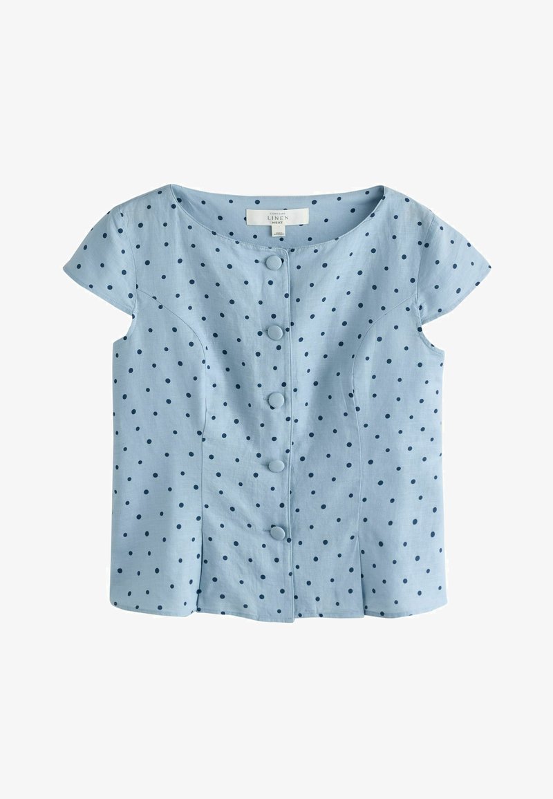 Blouse bleu clair à manches courtes avec des pois bleu marine et des boutons recouverts de tissu sur le devant, en mélange de lin.