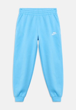 Ανοιχτού μπλε χρώματος φόρμα Nike με ελαστική μέση και μάνσες, πλαϊνές τσέπες και λευκό λογότυπο Nike στο πάνω αριστερό μηρό.