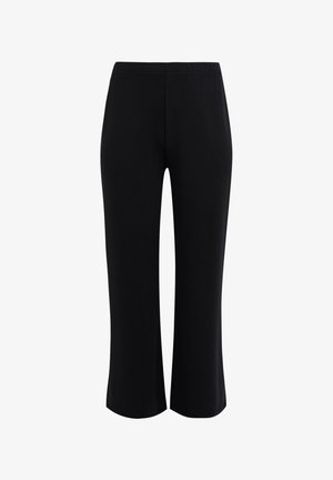 Sorte bukser med en afslappet pasform, der har en elastisk linning og en glat tekstur, som ender lidt over anklen uden synlige sømme.