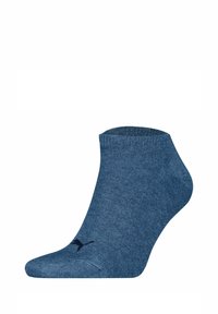 Ankelsocka i mörkblått med ribbad textur, slät yta och en kontrasterande svart logotyp på sidan.
