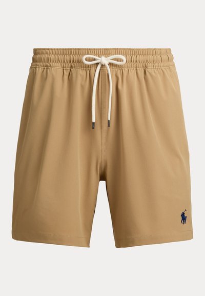 Ανδρικά μαγιό σε μπεζ ύφασμα με ελαστική μέση και κορδόνι. Διαθέτουν μικρό μπλε λογότυπο στο κάτω αριστερό μέρος.