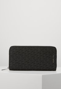 Michael Kors GREYSON TECH ZIP AROUND - Portemonnee - black