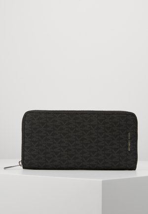 Michael Kors GREYSON TECH ZIP AROUND - Wallet - black