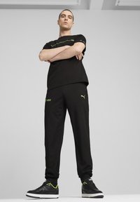 Puma MERCEDES-AMG PETRONAS F1 CLOUDSPUN - Tréningruha alsók - black