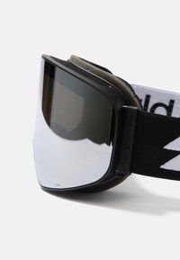 Skidglasögon med svart ram, spegelglas och mjukt skumfoder. Den elastiska remmen har en logotyp som ger en säker passform för aktiviteter.