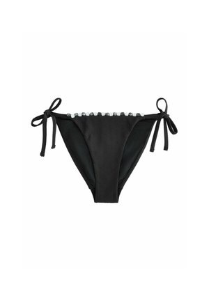 Čierne spodné diely bikin s viazaniami po stranách a malými bielymi korálkami pozdĺž horného okraja, s jemným textúrovaným vzorom.