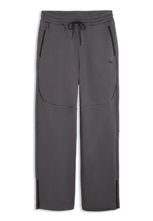 Donkergrijze Puma joggingbroek met elastische tailleband, zwarte trekkoord, ritszakken aan de voorkant en ritssluitingen onderaan de pijpen.