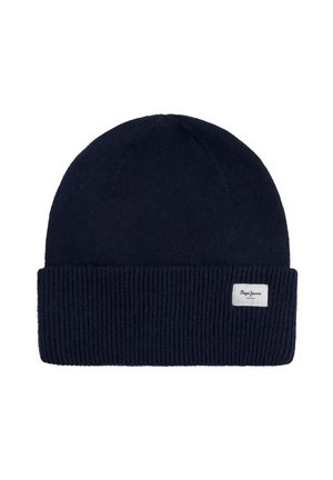 Gorro de punto en color marino con puño acanalado, textura suave y pequeña etiqueta de marca cosida en el lateral. Ideal para usar en climas fríos.