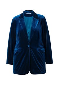 Tummansininen samettiblazeri, jossa on lovellinen kaulus, yksittäinen nappikiinnitys ja kaksi etutaskua. Varustettu sileällä vuorilla.