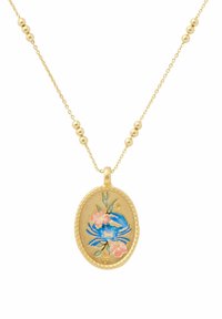 Gold necklace featuring an oval pendant with a blue crab design, surrounded by pink flowers and green leaves, on a beaded chain.