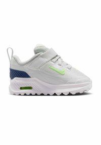 Witte en donkerblauwe peutersneaker met neon groene swoosh, klittenbandsluiting en zichtbaar luchtkussen in de zool op een witte achtergrond.