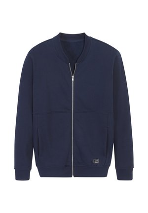 Navy blue zip-up bomber jacket with ribbed collar, cuffs, and hem, featuring two side pockets and a small logo patch near the bottom hem.