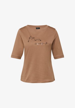 Brown short-sleeve shirt with "Mon coeur" embroidered in cursive and floral accents across the chest, round neckline, and relaxed fit.