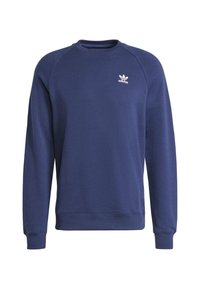 Sudadera azul marino de manga larga, con cuello redondo y puños de canalé. Presenta un pequeño logo blanco de Adidas en el pecho. Textura suave.