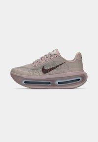 Nike Air Max sneaker, featuring a light pink mesh upper, dark pink accents, and a visible air cushioning system in the sole.