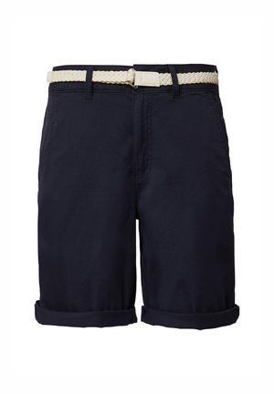 Tumši zili kokvilnas šorti ar austu gaiši brūnu jostu. Iezīmētas ar sarullētām piedurknēm un priekšējiem kabatām. Gluda tekstūra ar klasisku dizainu.