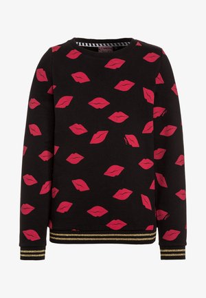 Sort langærmet sweatshirt med røde læbeaftryk over det hele og guldbelagte striber ved manchetter og kant.