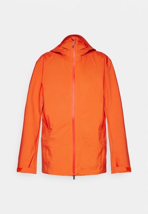 Orange jacka med huva, har framficka med dragkedja, två sidofickor och kontrasterande dragkedjedetaljer. Slät, väderbeständig tygtextur.