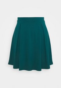 Teal utsvängd kjol i mjukt, stretchigt material, med en åtsittande midja och plisserade detaljer för extra rörelse.