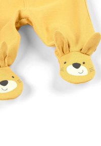 Gele babybroekjes met geïntegreerde konijnvormige voetbedekkingen met een speelse gezichtsontwerp. Zacht materiaal en een comfortabele pasvorm.