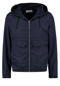 Navy blue lightweight jacket with a hood, zip front, two chest pockets, elastic cuffs, and hem, made from smooth, durable material.