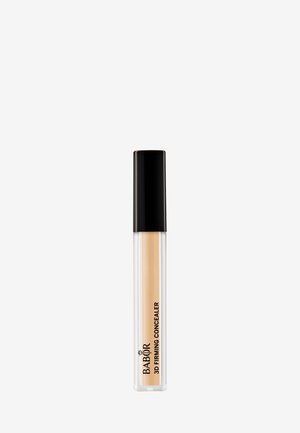 Babor 3D Firming Concealer i en klar tube med en sort hætte, der har en lys beige nuance og minimalistisk branding.