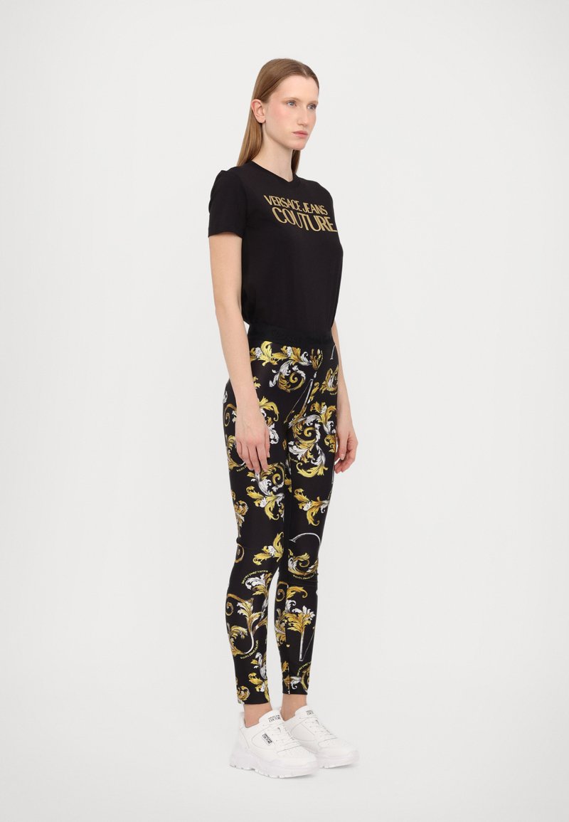 Versace Jeans Couture Leggings - Trousers - black/gold/black - Zalando